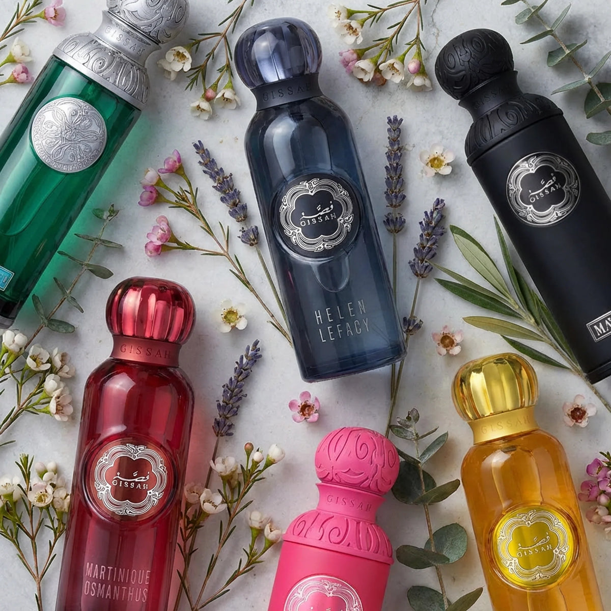 Collection of Gissah 200ml Perfumes surrounded by plants