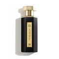Reef - 19 100ml perfume bottle with gold cap and label on a white background