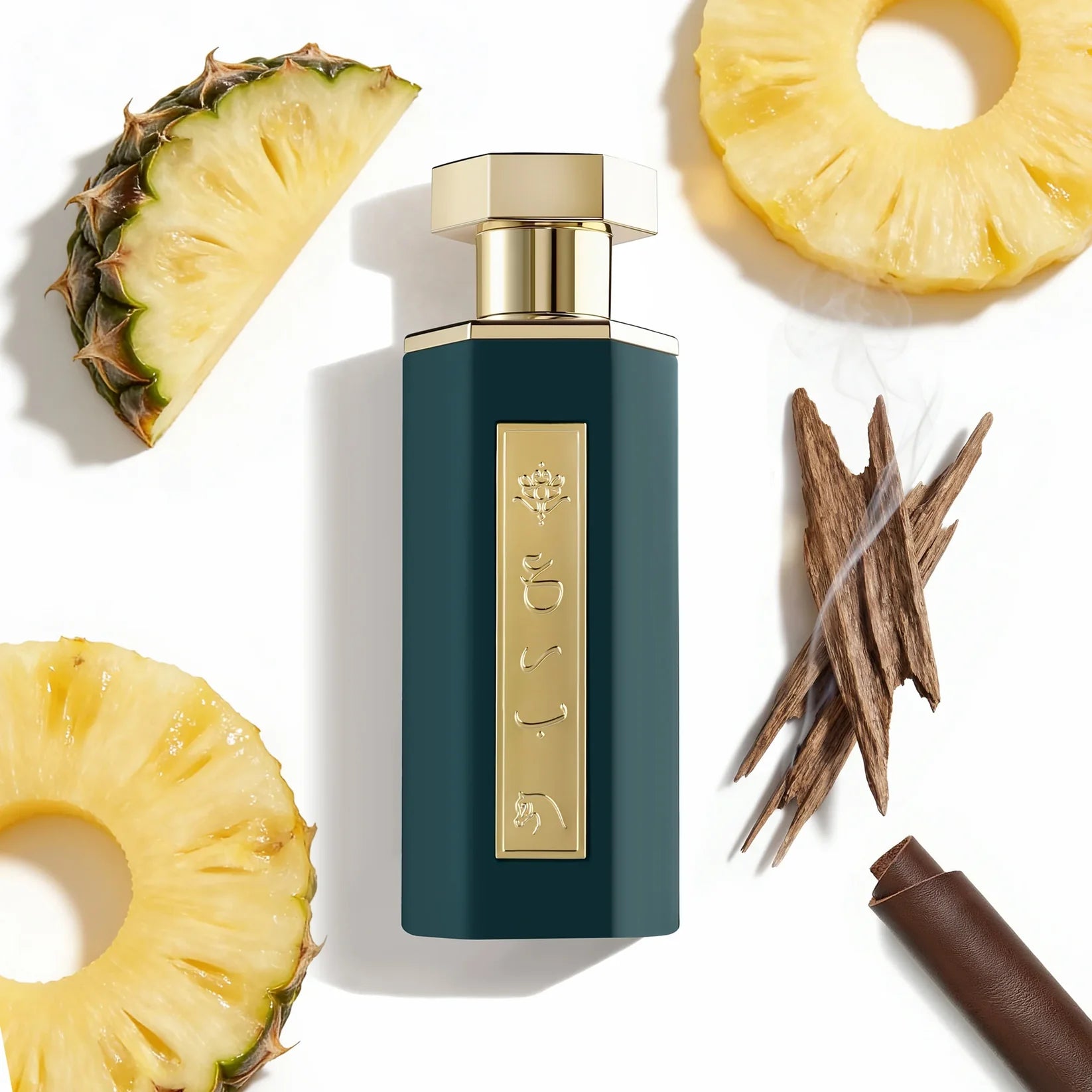 Reef - Arabs of Obeya 100ml perfume bottle with pineapple slices and a knife on a white background
